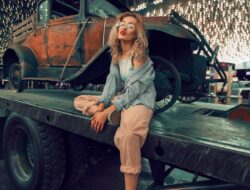 Nighttime Serenity: Woman’s solitude on a utility trailer